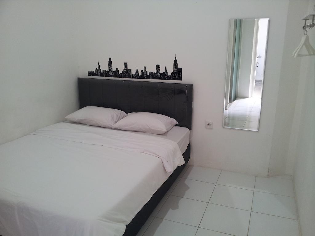 Loxy Inn Surabaya Kamer foto