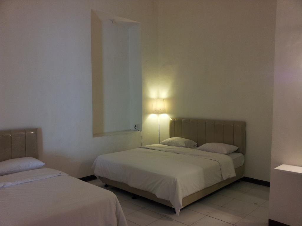 Loxy Inn Surabaya Kamer foto