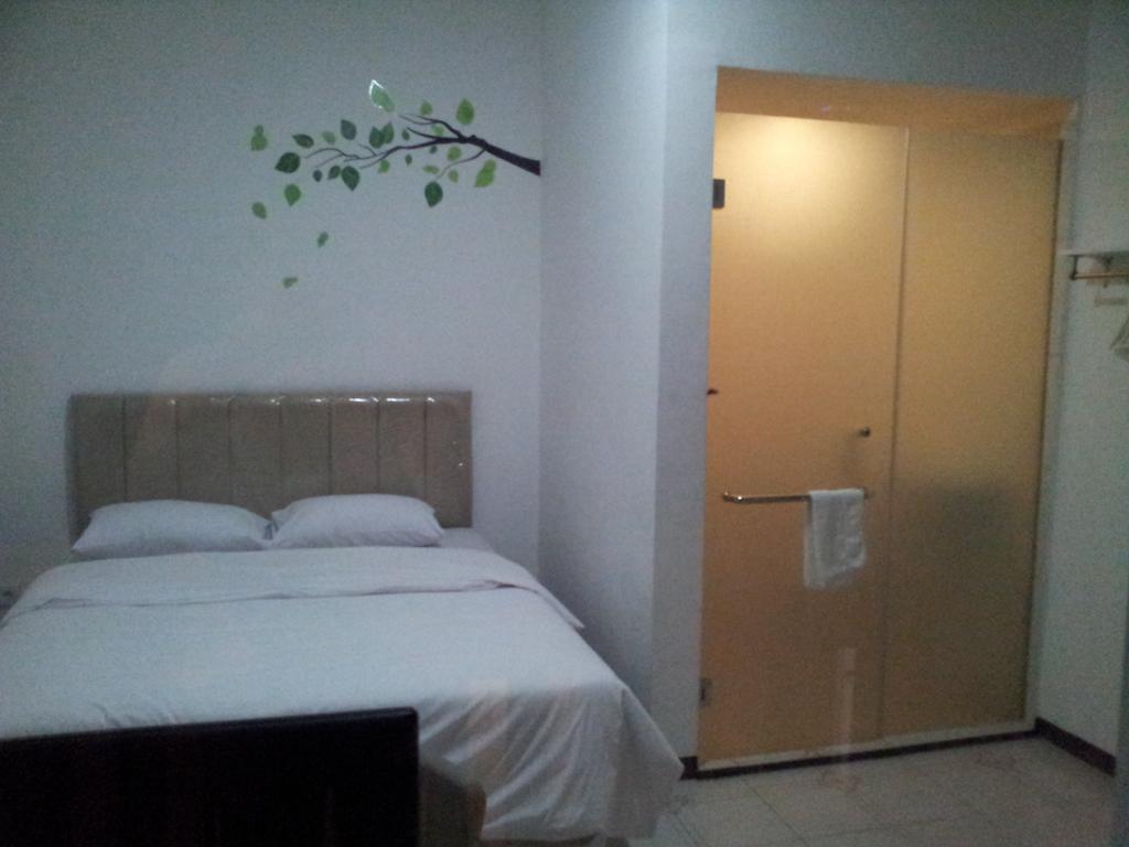 Loxy Inn Surabaya Kamer foto