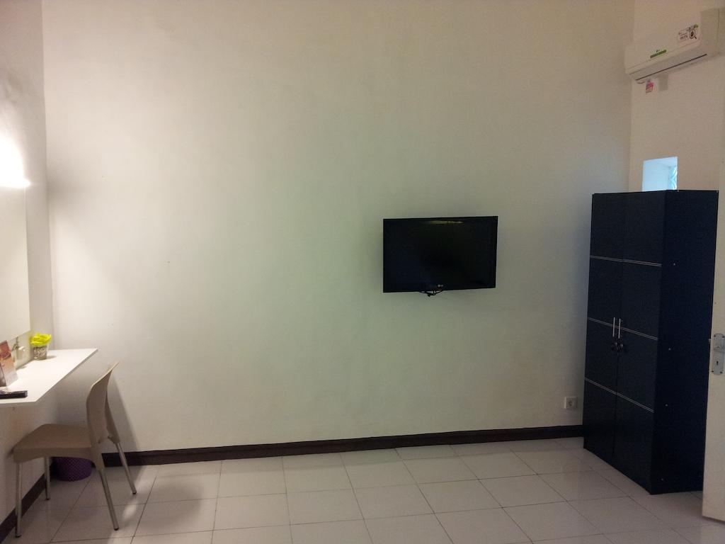Loxy Inn Surabaya Kamer foto